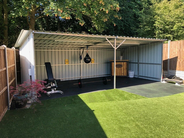Metal Field Shelter Transformed into Home Gym